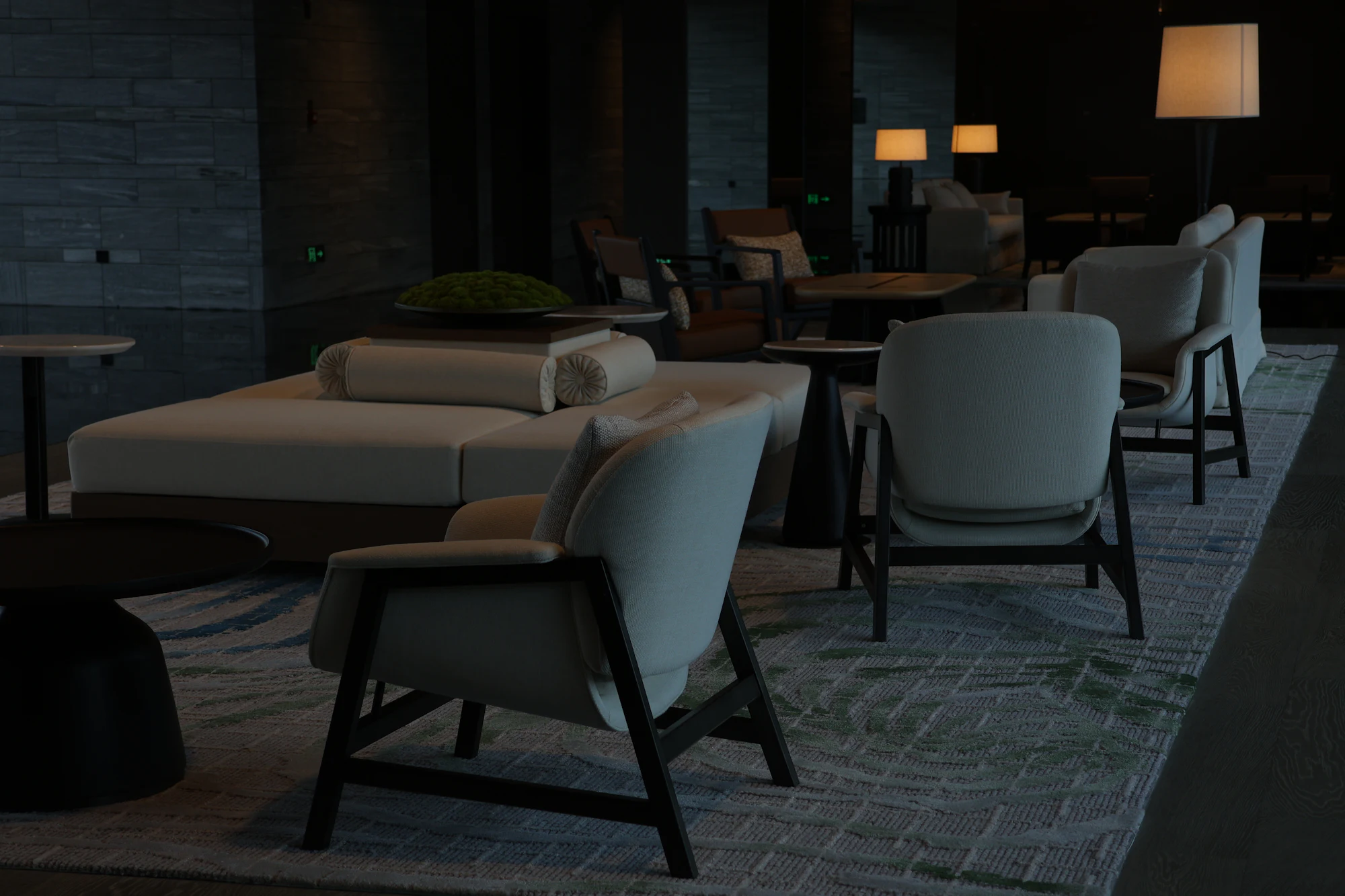 Modern hotel lounge with armchairs and lamps